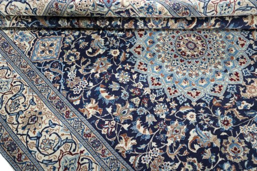 Close-up detail of 2000s Nain rug from Iran / Persia showing Wool weave