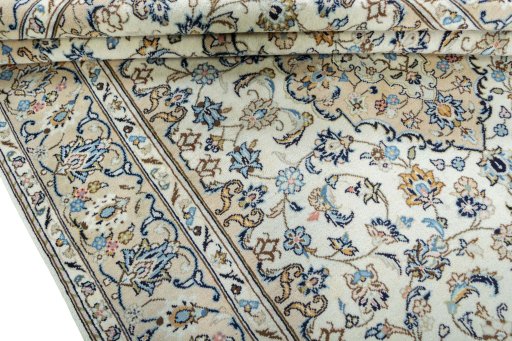 Close-up detail of New Kashan rug from Iran / Persia showing Wool weave