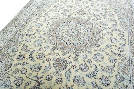 Backside of handmade 2000s Nain rug showing knot structure and weave density
