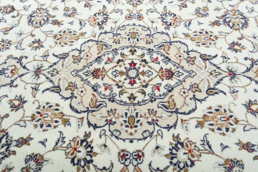 Central medallion detail of 2000s Kashan rug from Iran / Persia
