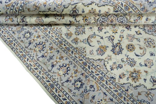 Close-up detail of New Kashan rug from Iran / Persia showing Wool weave