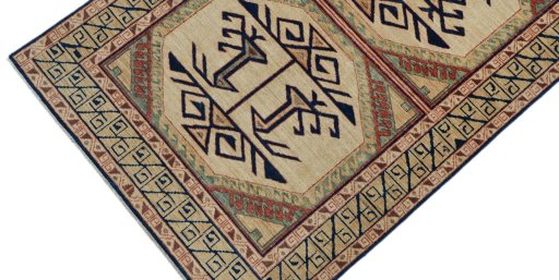 Backside of handmade New Kazak rug showing knot structure and weave density
