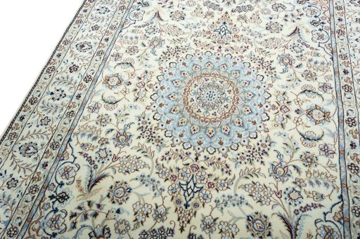 Backside of handmade 2000s Nain rug showing knot structure and weave density