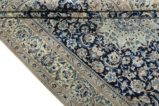 Close-up detail of 2000s Nain rug from Iran / Persia showing Wool weave