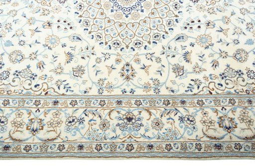 Corner detail of New Nain rug showing border pattern and Wool pile