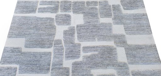 Backside of handmade New Morocco rug showing knot structure and weave density