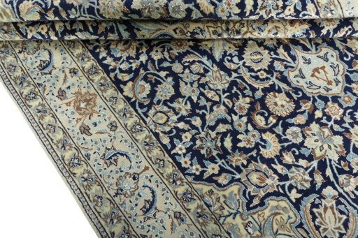 Close-up detail of 2000s Nain rug from Iran / Persia showing Wool weave