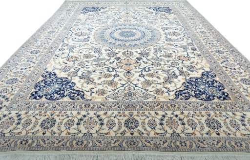 Surface texture of 2000s Nain rug with natural Wool and intricate pattern