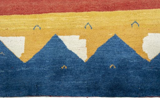 Central medallion detail of 2000s Persian Gabbeh rug from Pakistan
