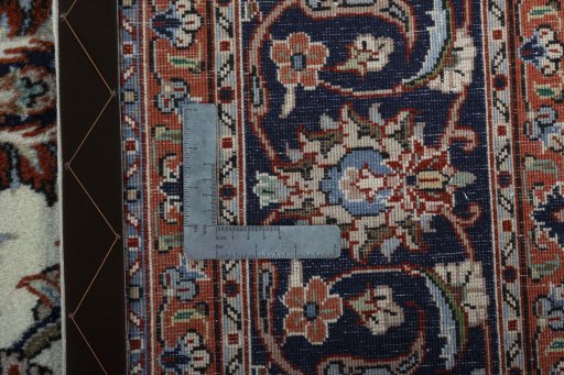 Backside of handmade 2000s Mashad rug showing knot structure and weave density