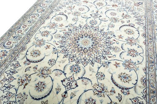 Backside of handmade 2000s Nain rug showing knot structure and weave density