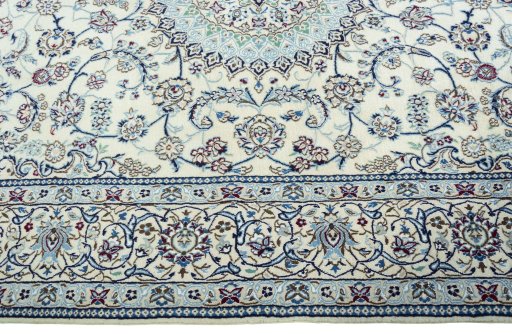 Corner detail of 2000s Nain rug showing border pattern and Wool pile