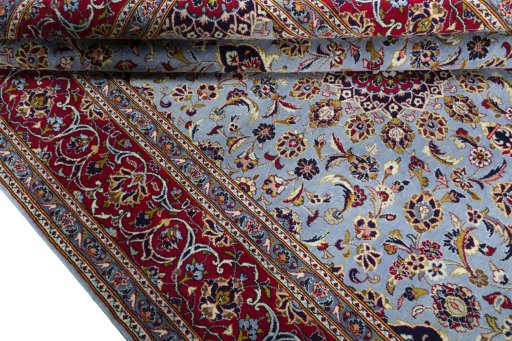 Close-up detail of 2000s Kashan rug from Iran / Persia showing Wool weave