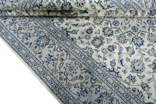 Close-up detail of 2000s Kashan rug from Iran / Persia showing Wool weave