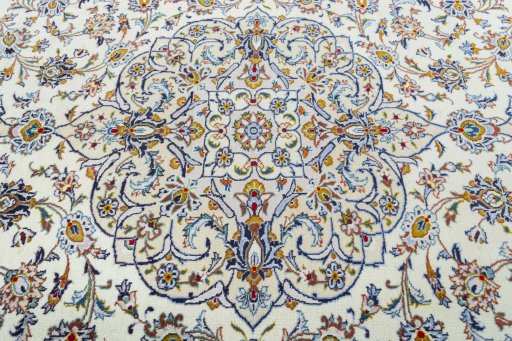Central medallion detail of 2000s Kashan rug from Iran / Persia