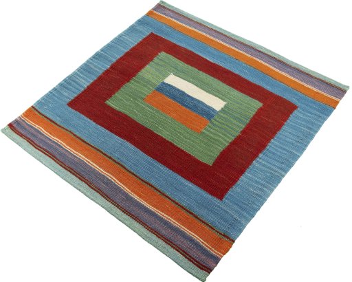 Corner detail of New Kilim Sofre rug showing border pattern and Wool pile