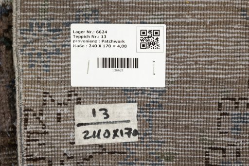 Corner detail of 1960s Patchwork rug showing border pattern and Wool pile