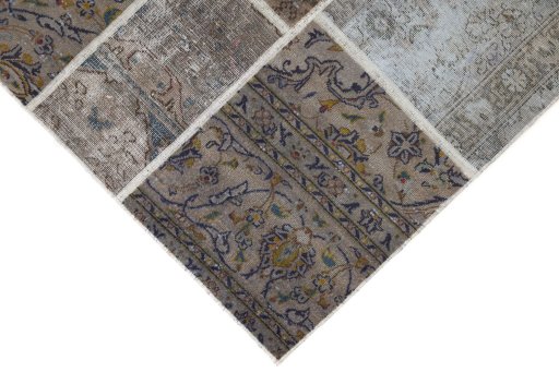 Backside of handmade 1960s Patchwork rug showing knot structure and weave density