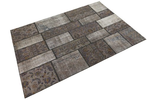 Corner detail of 1960s Patchwork rug showing border pattern and Wool pile