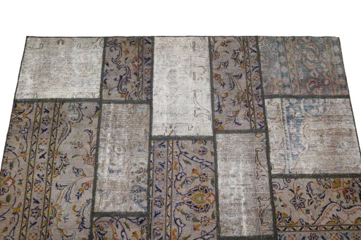 Surface texture of 1960s Patchwork rug with natural Wool and intricate pattern