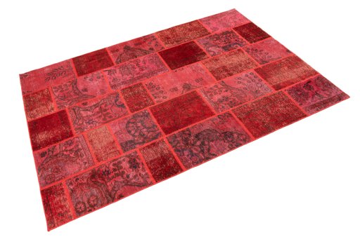 Corner detail of 1960s Patchwork rug showing border pattern and Wool pile