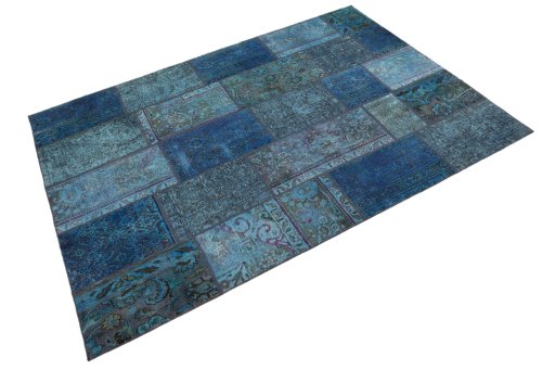 Corner detail of 1960s Patchwork rug showing border pattern and Wool pile