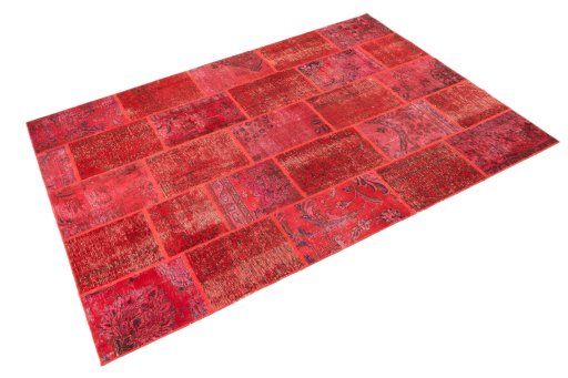 Corner detail of 1960s Patchwork rug showing border pattern and Wool pile