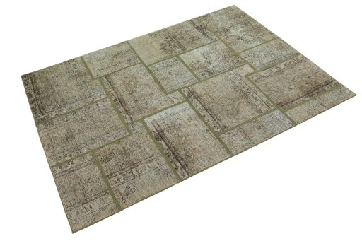 Corner detail of 1960s Patchwork rug showing border pattern and Wool pile