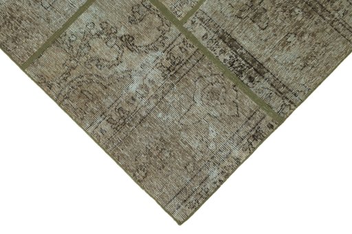 Backside of handmade 1960s Patchwork rug showing knot structure and weave density