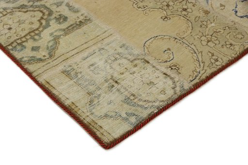 Backside of handmade 1960s Patchwork rug showing knot structure and weave density