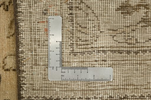 Corner detail of 1940s Vintage rug showing border pattern and Wool pile