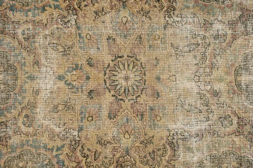 Backside of handmade 1920s Vintage rug showing knot structure and weave density