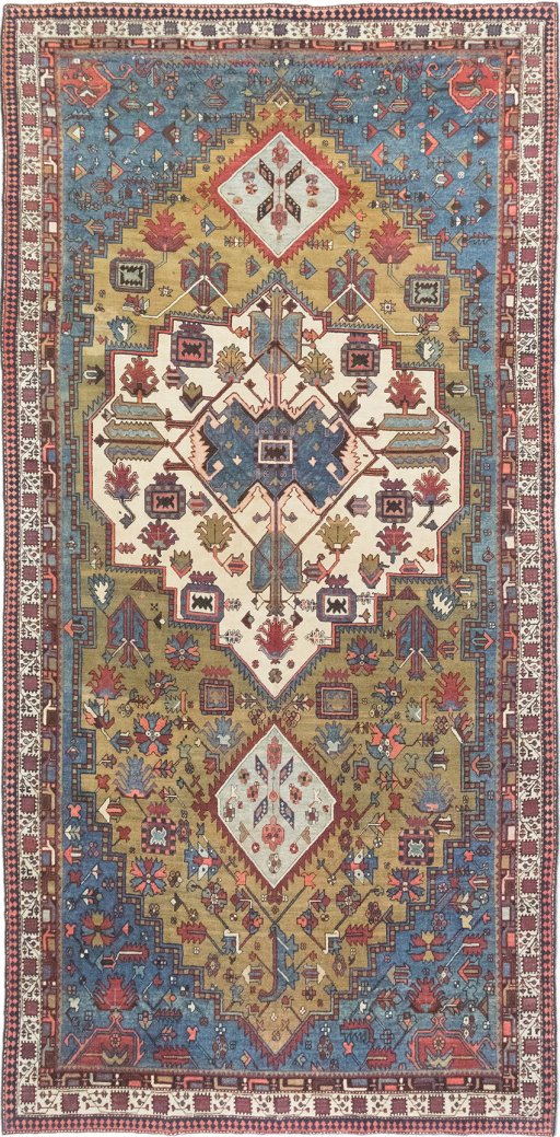 Full view of 1900s Vintage rug from Iran / Persia, 562 × 273 cm in Green tones