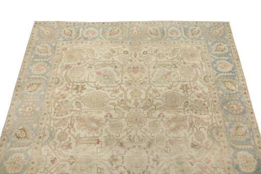 Surface texture of 1920s Vintage rug with natural Wool and intricate pattern