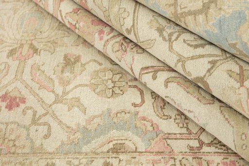 Close-up detail of 1920s Vintage rug from Iran / Persia showing Wool weave