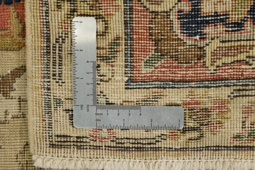 Corner detail of 1940s Vintage rug showing border pattern and Wool pile