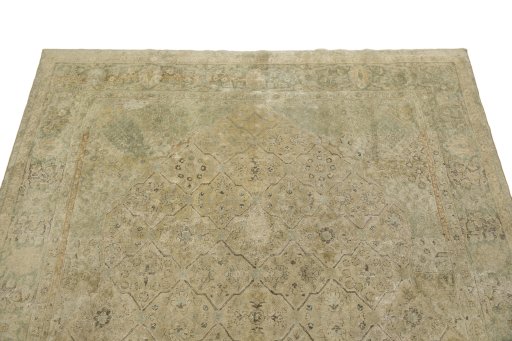 Surface texture of 1930s Vintage rug with natural Wool and intricate pattern