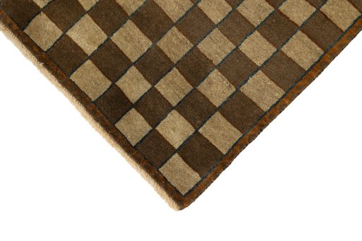 Backside of handmade New Vintage rug showing knot structure and weave density