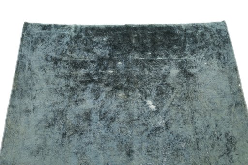 Surface texture of 1940s Vintage rug with natural Wool and intricate pattern