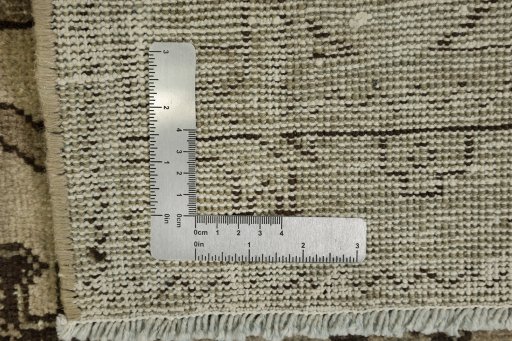 Corner detail of 1940s Vintage rug showing border pattern and Wool pile