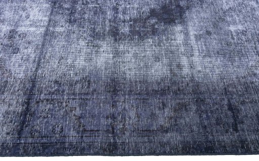 Corner detail of 1970s Vintage rug showing border pattern and Wool pile