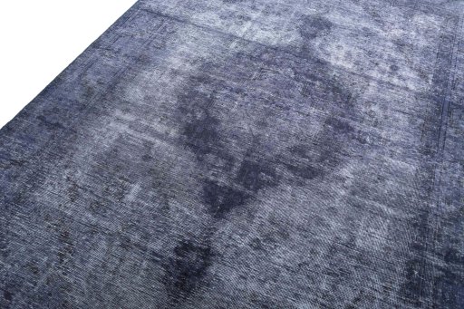 Backside of handmade 1970s Vintage rug showing knot structure and weave density