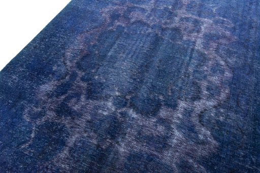 Backside of handmade 1970s Vintage rug showing knot structure and weave density