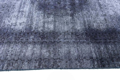 Corner detail of 1970s Vintage rug showing border pattern and Wool pile