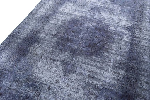 Backside of handmade 1970s Vintage rug showing knot structure and weave density