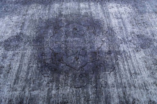 Central medallion detail of 1970s Vintage rug from Iran / Persia