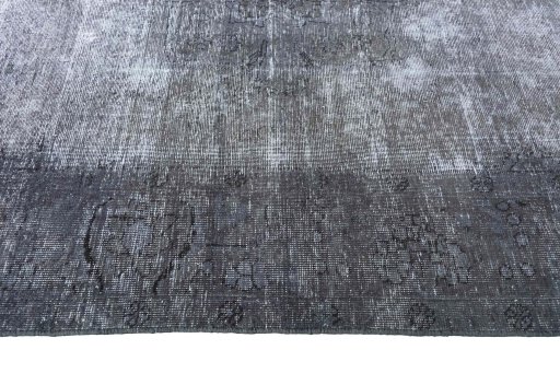 Corner detail of 1970s Vintage rug showing border pattern and Wool pile