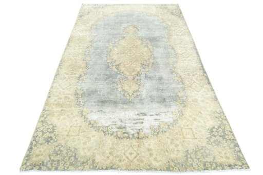 Surface texture of 1970s Vintage rug with natural Wool and intricate pattern
