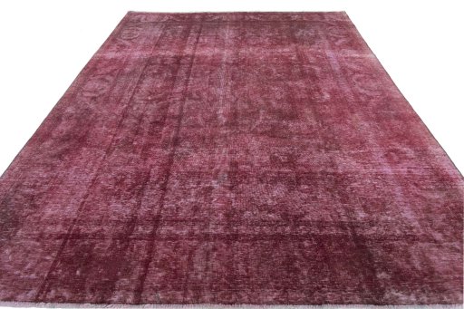 Surface texture of 1970s Vintage rug with natural Wool and intricate pattern