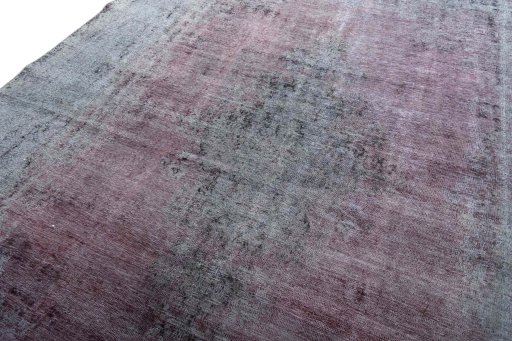 Backside of handmade 1970s Vintage rug showing knot structure and weave density